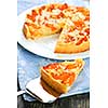 Slice of fresh baked apricot and almond pie dessert