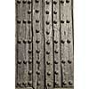Background of old wooden door with metal studs