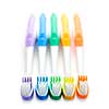 Close up of multicolored toothbrushes on white background