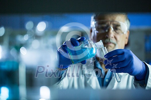 Senior male researcher carrying out scientific research in a lab (shallow DOF; color toned image) Senior male researcher carrying out scientific research in a lab (shallow DOF; color toned image)