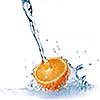 fresh water drops on orange isolated on white
