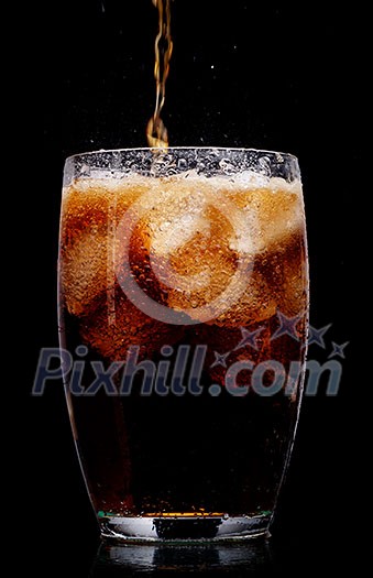 Glass of cola with ice on black background Glass of cola with ice on black background