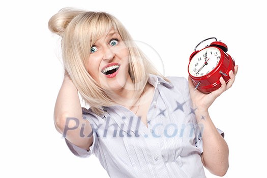 Shocked beautiful young woman with alarm clock isolated on white Shocked beautiful young woman with alarm clock isolated on white