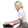 Business woman with vintage typing machine on white