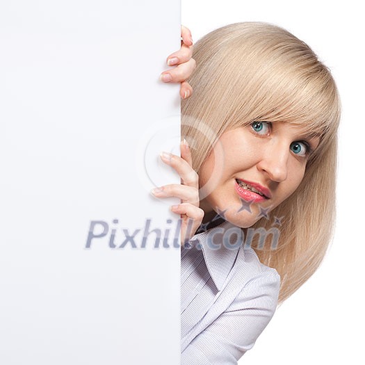 embarrassed young woman holding white empty paper isolated on white embarrassed young woman holding white empty paper isolated on white