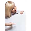 Attractive smiling woman holding white empty paper isolated on white