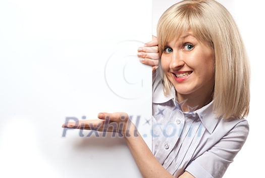 Attractive smiling woman holding white empty paper isolated on white Attractive smiling woman holding white empty paper isolated on white