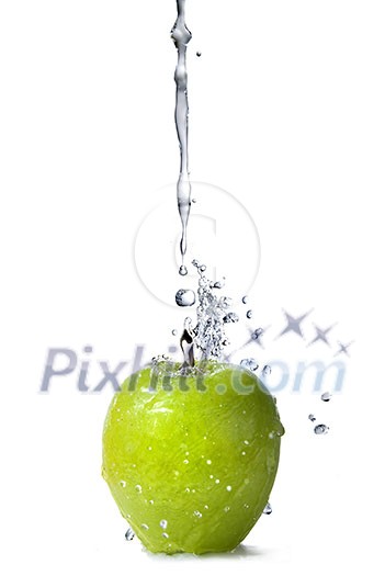 fresh water splash on green apple isolated on white fresh water splash on green apple isolated on white
