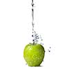 fresh water splash on green apple isolated on white
