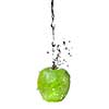 fresh water splash on green apple isolated on white