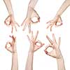 Hand OK sign isolated on white