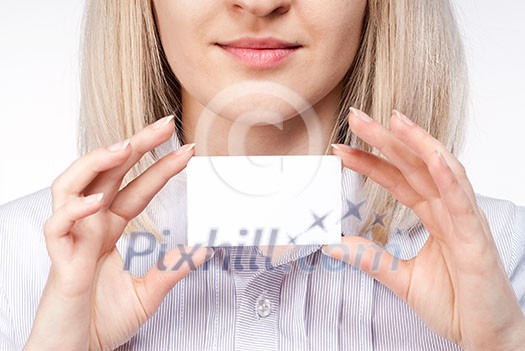 Woman hand holding empty visiting card Woman hand holding empty visiting card