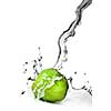 fresh water splash on green apple isolated on white