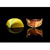tasty yellow chocolate candy on a black background