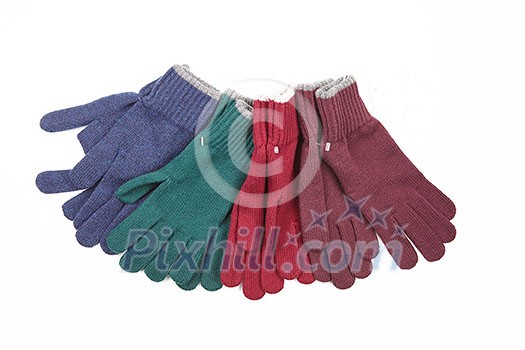 many colored gloves. Winter accessories isolated on white background. many colored gloves. Winter accessories isolated on white background.