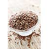 Bowl full of brown flax seed or linseed