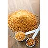 Organic coconut palm sugar in measuring spoons