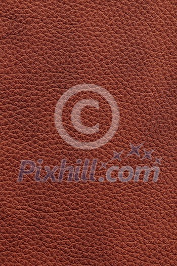 Brown natural leather background or texture close up Brown natural leather background or texture close up