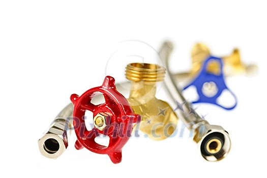 Isolated plumbing valves hoses and assorted parts Isolated plumbing valves hoses and assorted parts