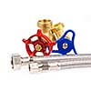 Blue and red plumbing valves with metal hoses