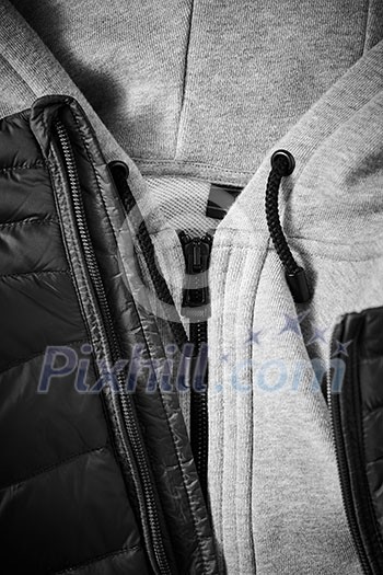 Half winter warm jacket and sweater. Clothing background Half winter warm jacket and sweater. Clothing background