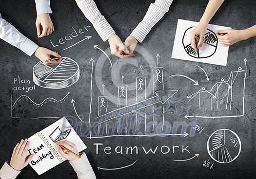 Top view of people hands drawing business teamwork strategy Top view of people hands drawing business teamwork strategy