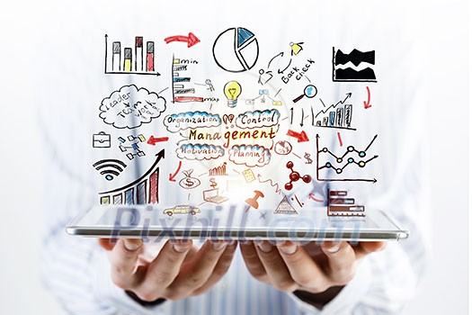 Businessman hands demostrating business strategy plan on tablet screen Businessman hands demostrating business strategy plan on tablet screen