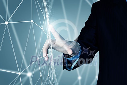 Businessman hand touching with finger digital connection lines on virtual screen Businessman hand touching with finger digital connection lines on virtual screen