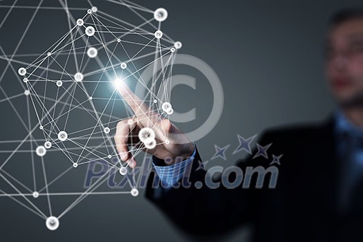 Businessman hand touching with finger digital connection lines on virtual screen Businessman hand touching with finger digital connection lines on virtual screen