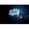 Business person hand touching gear mechanism representing interaction concept