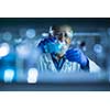 Senior male researcher carrying out scientific research in a lab (shallow DOF; color toned image)