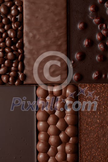 texture of various chocolate with nuts . Food background texture of various chocolate with nuts . Food background