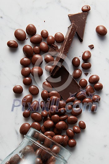 background chocolate balls on a marble background background chocolate balls on a marble background