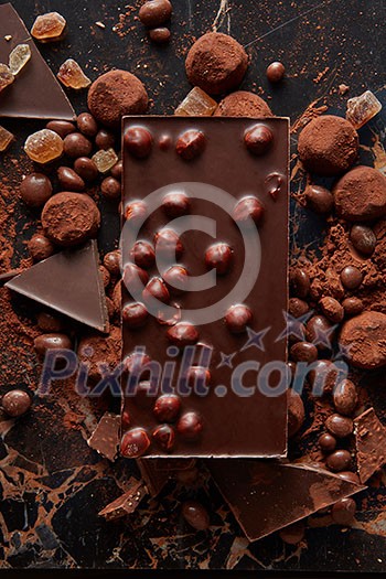 Chocolate and sweets isolated on black background Chocolate and sweets isolated on black background