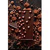 Chocolate and sweets isolated on black background