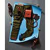 Set of mans fashion and accessories on blue paper and concrete black background