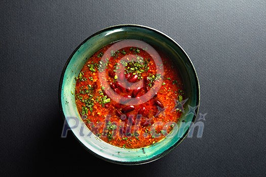 Ukrainian and russian national red soup isolated on black Ukrainian and russian national red soup isolated on black