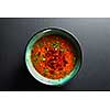 Ukrainian and russian national red soup isolated on black