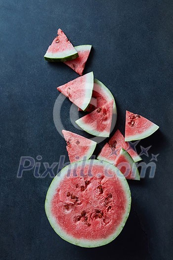 Slice of watermelon on black background Slice of watermelon on black background