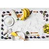 banana pie ingredients with berries on white background.