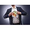 man in suit with salad inside isolated on dark. Natural healthy food concept