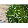 Savoy cabbage super food close up in wooden background