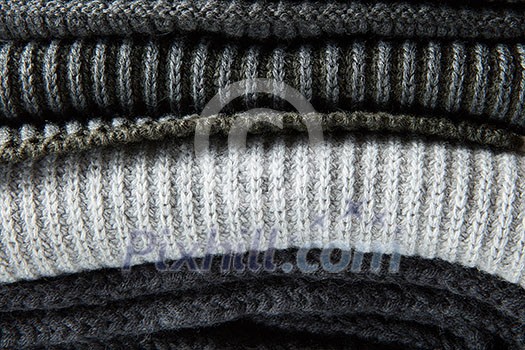 close-up of gray knitted shawl texture for background close-up of gray knitted shawl texture for background