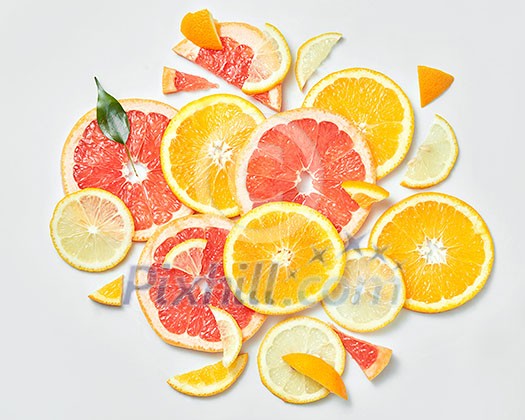 background with citrus-fruit of grapefruit slices. On white background background with citrus-fruit of grapefruit slices. On white background