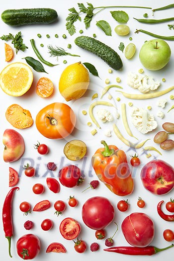 Rainbow collection of fruits and vegetables on white backdrop, weight loss, food for vegans and healthy diet. Rainbow collection of fruits and vegetables on white backdrop, weight loss, food for vegans and healthy diet.