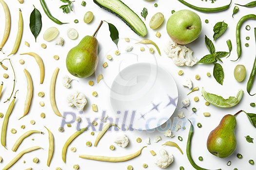 green vegetables and fruits for white background. Healthy eating and food for vegans green vegetables and fruits for white background. Healthy eating and food for vegans