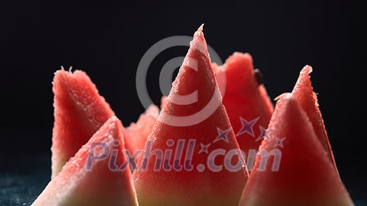 slices of ripe juicy watermelon isolated on black background slices of ripe juicy watermelon isolated on black background