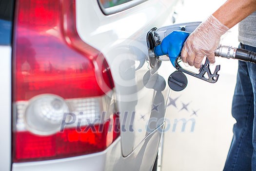 Car fueling at the gas station Car fueling at the gas station
