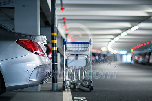 Underground parking/garage (shallow DOF; color toned image) Underground parking/garage (shallow DOF; color toned image)