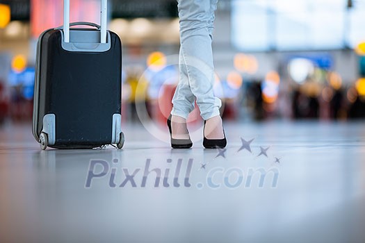 Pretty young female passenger at the airport (shallow DOF; color toned image) Pretty young female passenger at the airport (shallow DOF; color toned image)